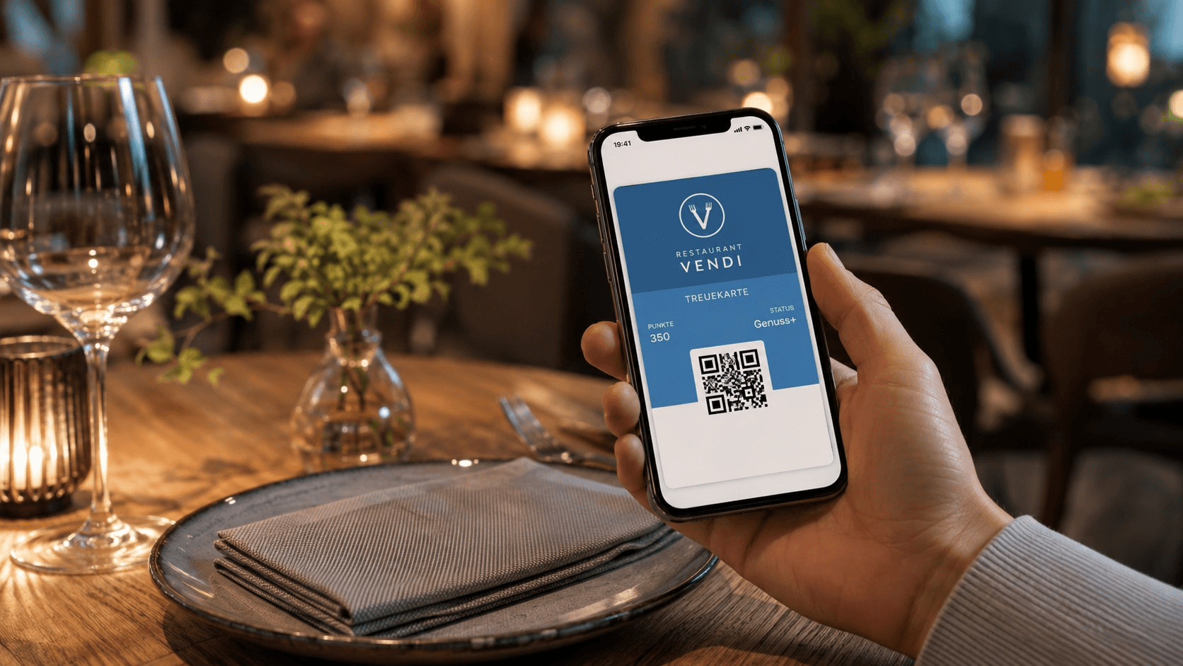 Digitale Treuekarte von vend.AI mit QR Code auf einem Smartphone in einem Restaurant.